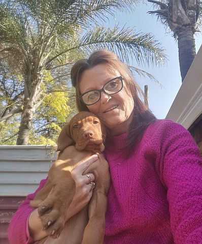 Breeder with puppy